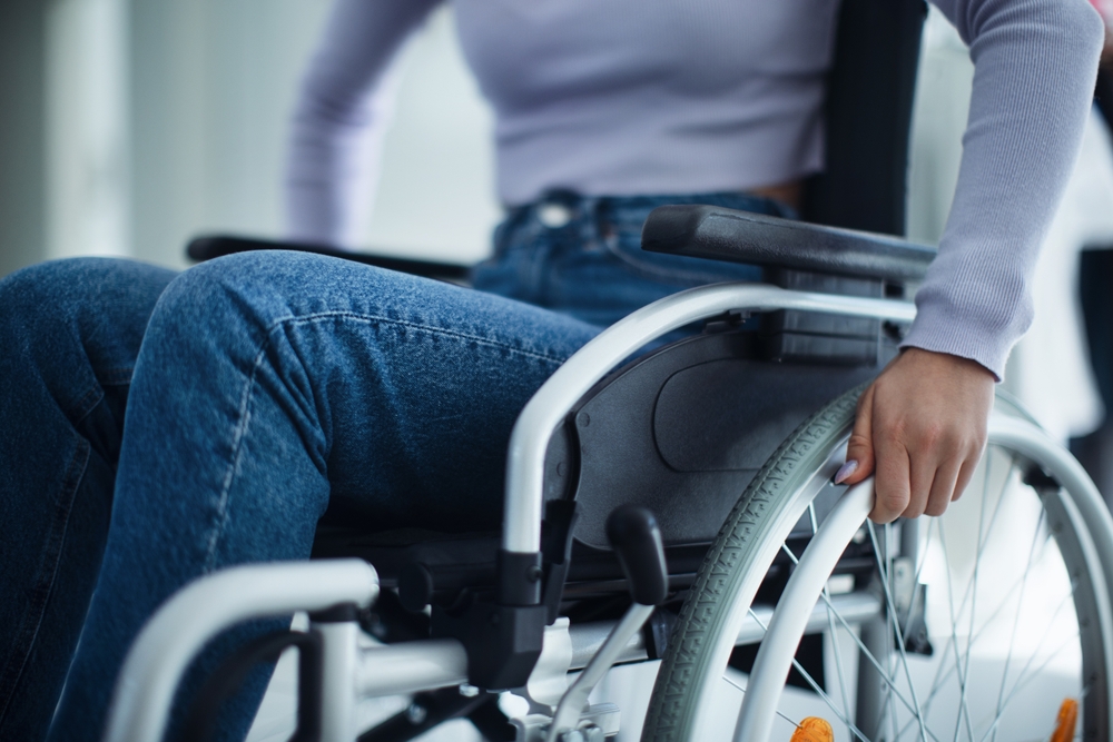 Person experiencing fatigue at home related to an autoimmune condition