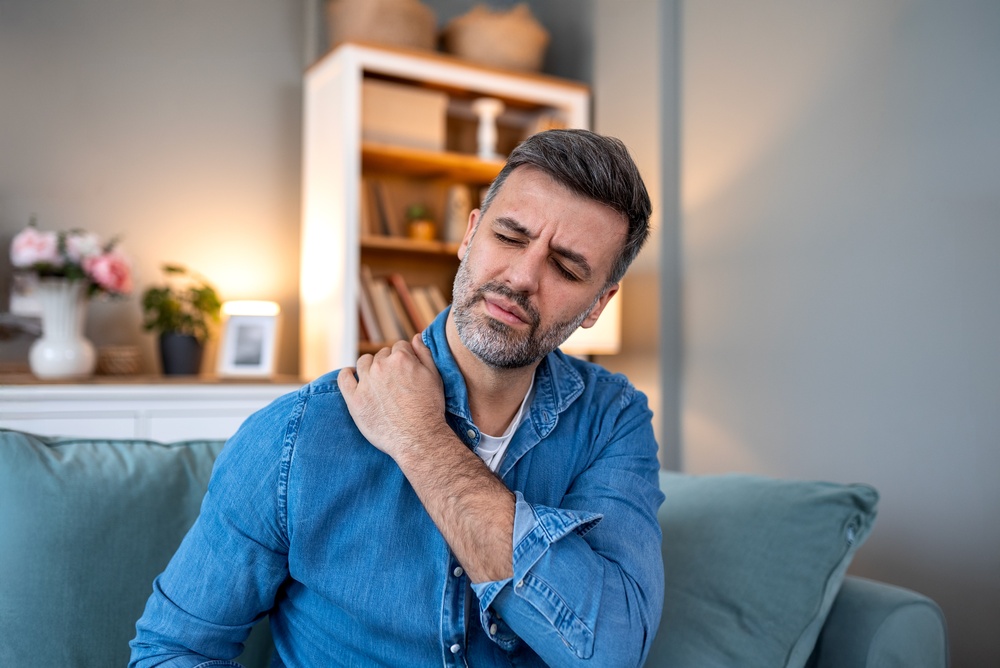 Doctor consulting with a patient about non-surgical joint disease treatment